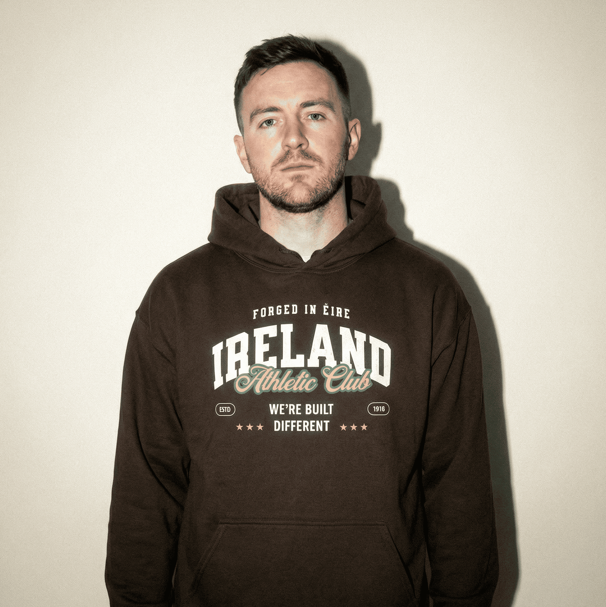 Eirin Apparel Unisex Hoodie Dark Chocolate / S 'Built Different' Sports Hoodie