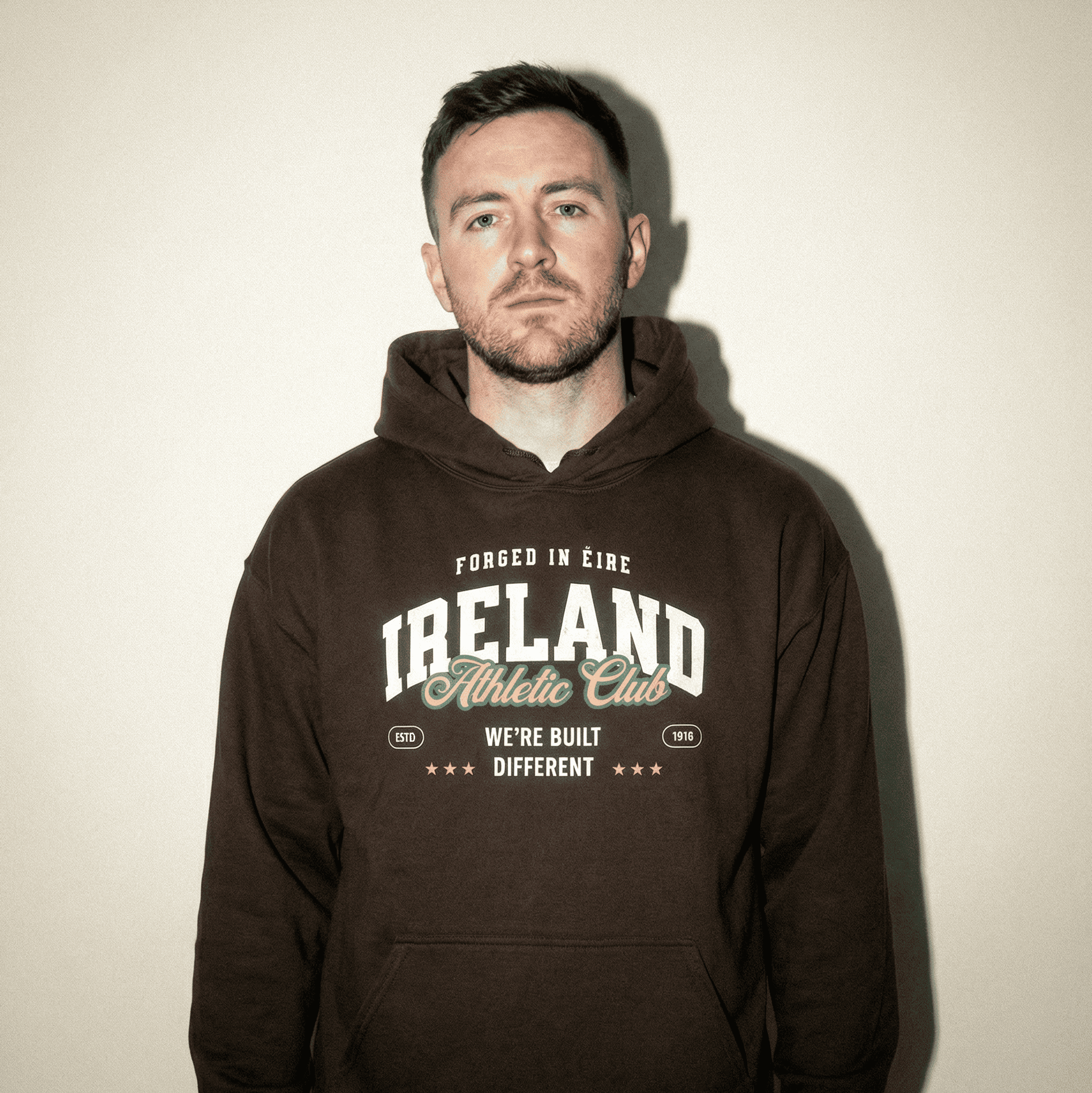 Eirin Apparel Unisex Hoodie Dark Chocolate / S 'Built Different' Sports Hoodie