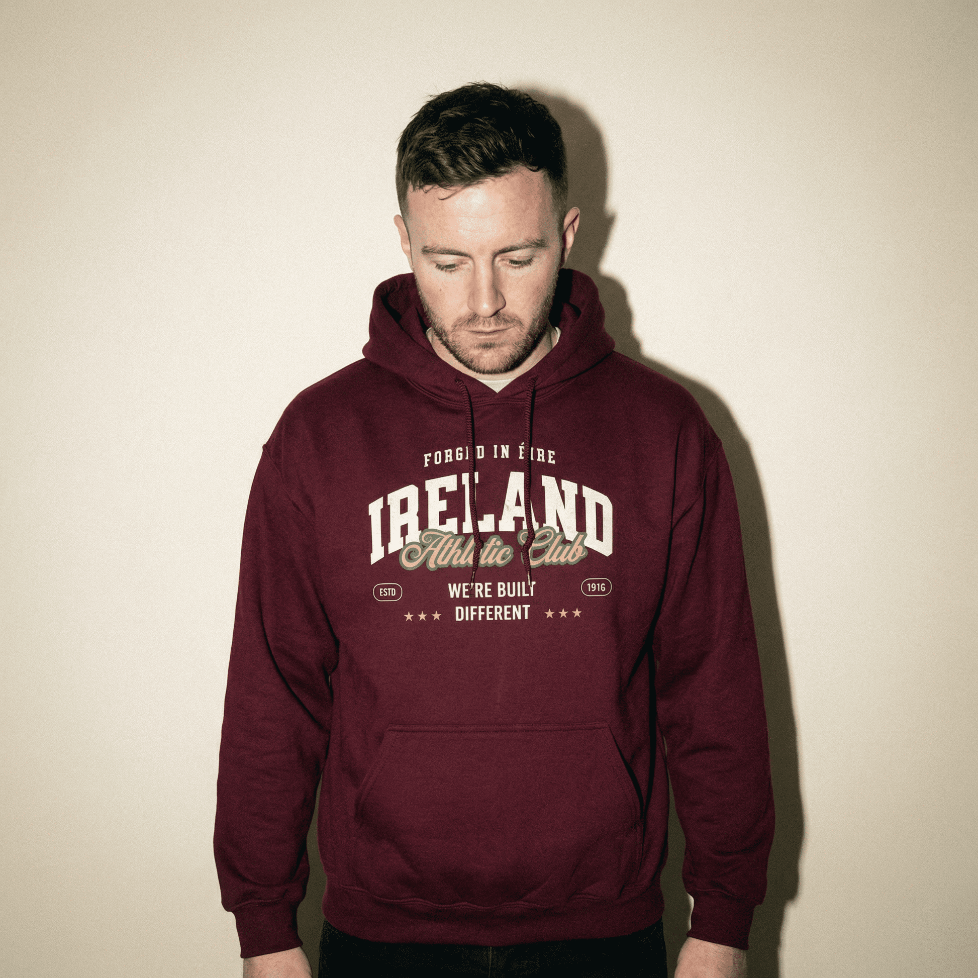 Eirin Apparel Unisex Hoodie Maroon / S 'Built Different' Sports Hoodie