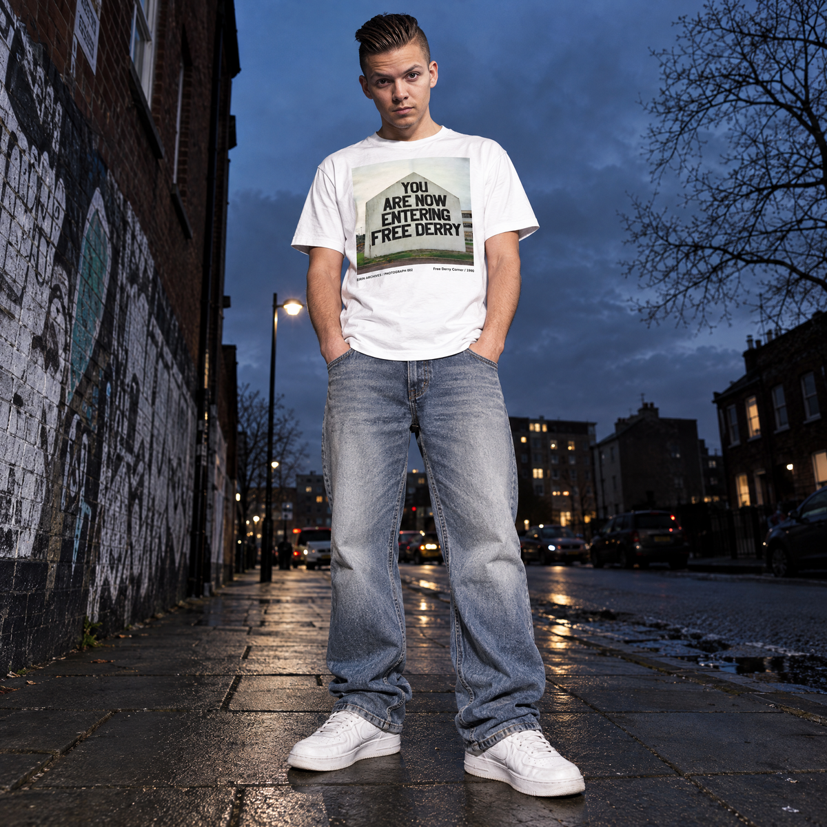 Eirin Apparel Unisex T-Shirt EIRIN ARCHIVES / PHOTOGRAPH 002 – Free Derry Corner 1990